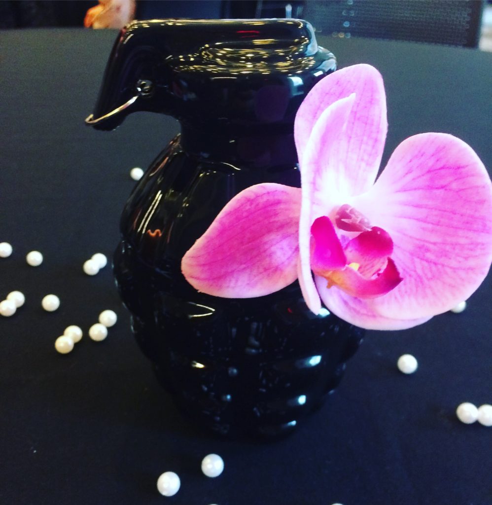 Pearls, flowers and grenades - centerpieces at Fashion Revolutions symposium